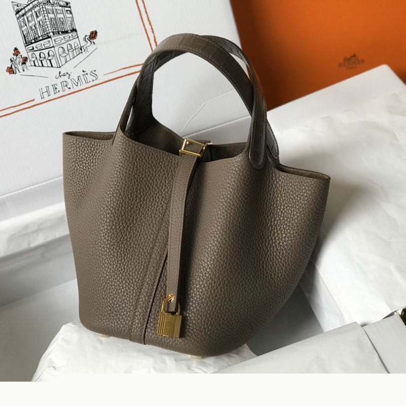 H**mes shopping bags